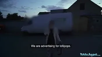 Public Agent Chanel Kiss lollipop sucker is taken from behind after giving a worldclass blowjob