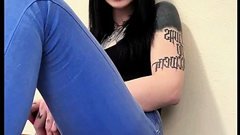 Goth slut destroys blue jeans and her tight creamy pussy