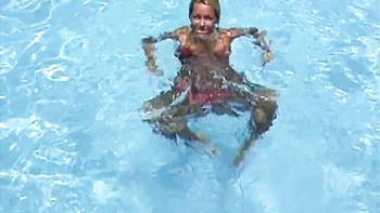 Sophie Moone shows off her nice bikini body by the poolside