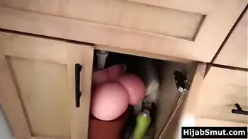 Hijab wearing muslim MILF caught husband fucking sex toy