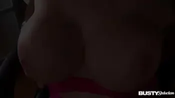 Busty brunette bombshell Charley Atwell teases with a sexy titty play solo