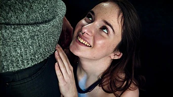 Hazel Moore and Madison peeling bananas on the bed