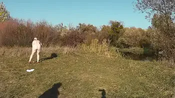 Wild beach. Nude in public. Outdoor on bank of river naked sexy mom MILF Frina learns to play badminton together with her naked lover. Outside. Nudist beach. Pussy natural tits ass Milf