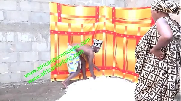 the muscular traditional african fetish marabout with a bodybuilding body and big cock fucks clients and faithful in his traditional treatment laboratory publicly in front of his other patient.  Live exclusively on xvideos.com and XVIDEOS RED