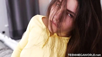 Sensual hottie Betty Lang nicely plays with her wet shaved pussy