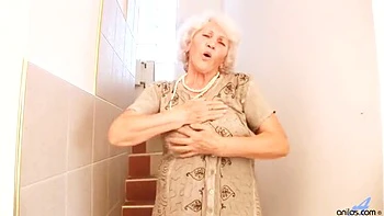 Granny Norma Fingers Herself with Pearl Dildo in Lingerie