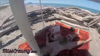 Risky Public Handjob on the Canary Beach Caught reading a book - MissCreamy