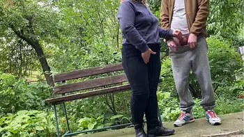 Cum on big ass MILF in jeans in the park